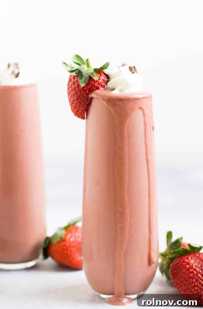 Decadent Strawberry Chocolate Swirl 3 Close-up shot of a creamy Chocolate Strawberry Smoothie with swirls of chocolate.