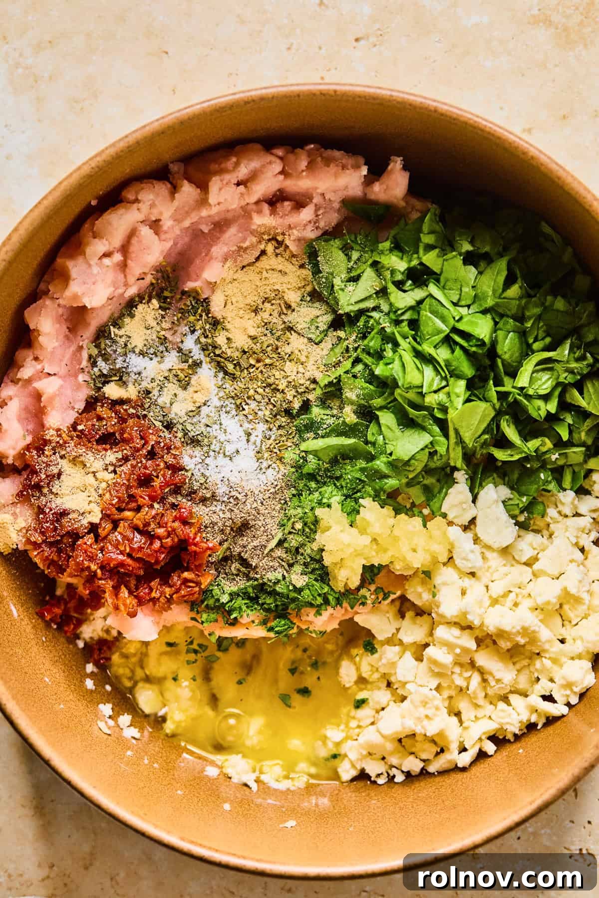 Turkey Meatballs with a Spinach-Feta Swirl 6 Turkey, egg, spinach, feta and other ingredients in mixing bowl.