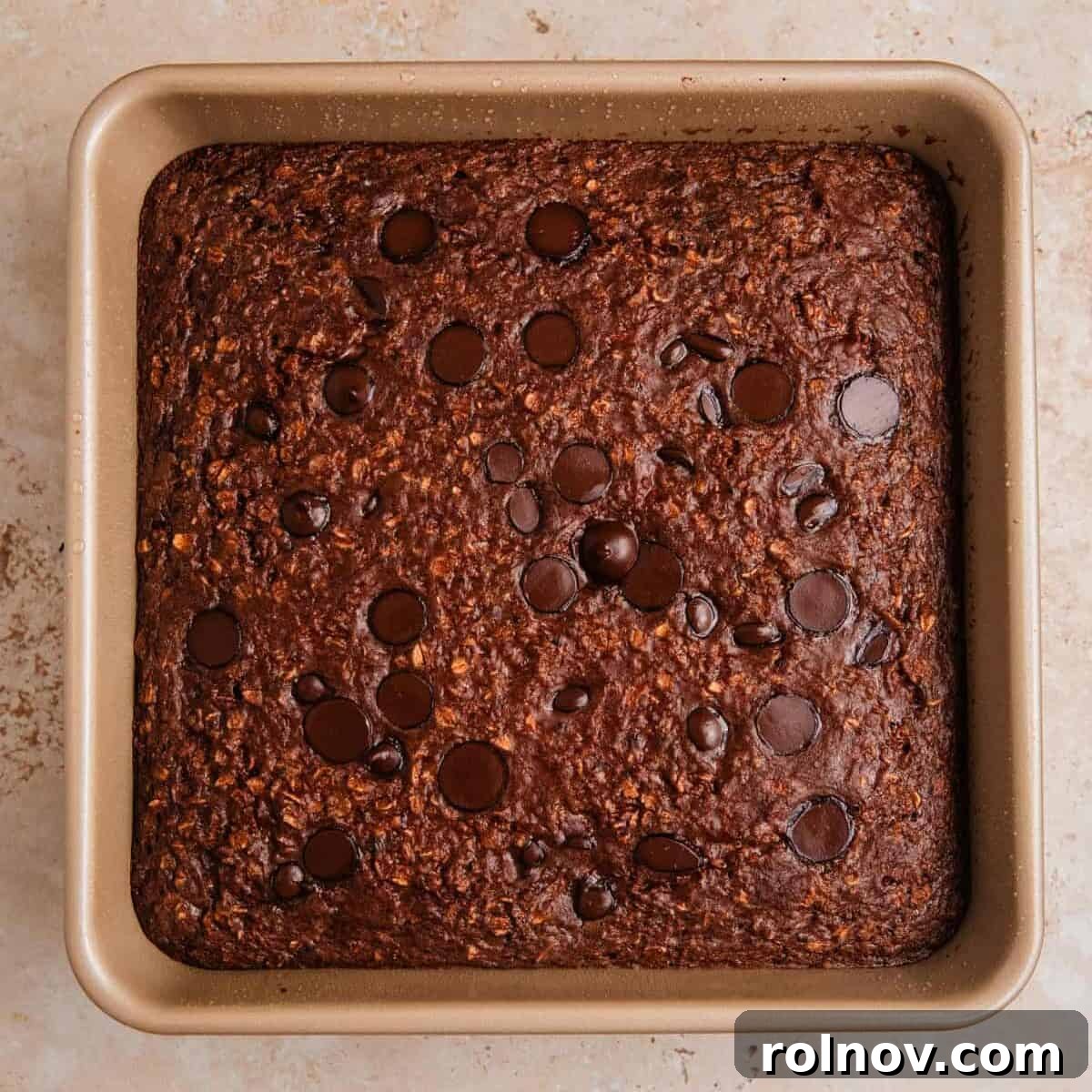 Decadent Chocolate Baked Oats 8 Freshly baked chocolate oats cooling in the baking pan after being removed from the oven.