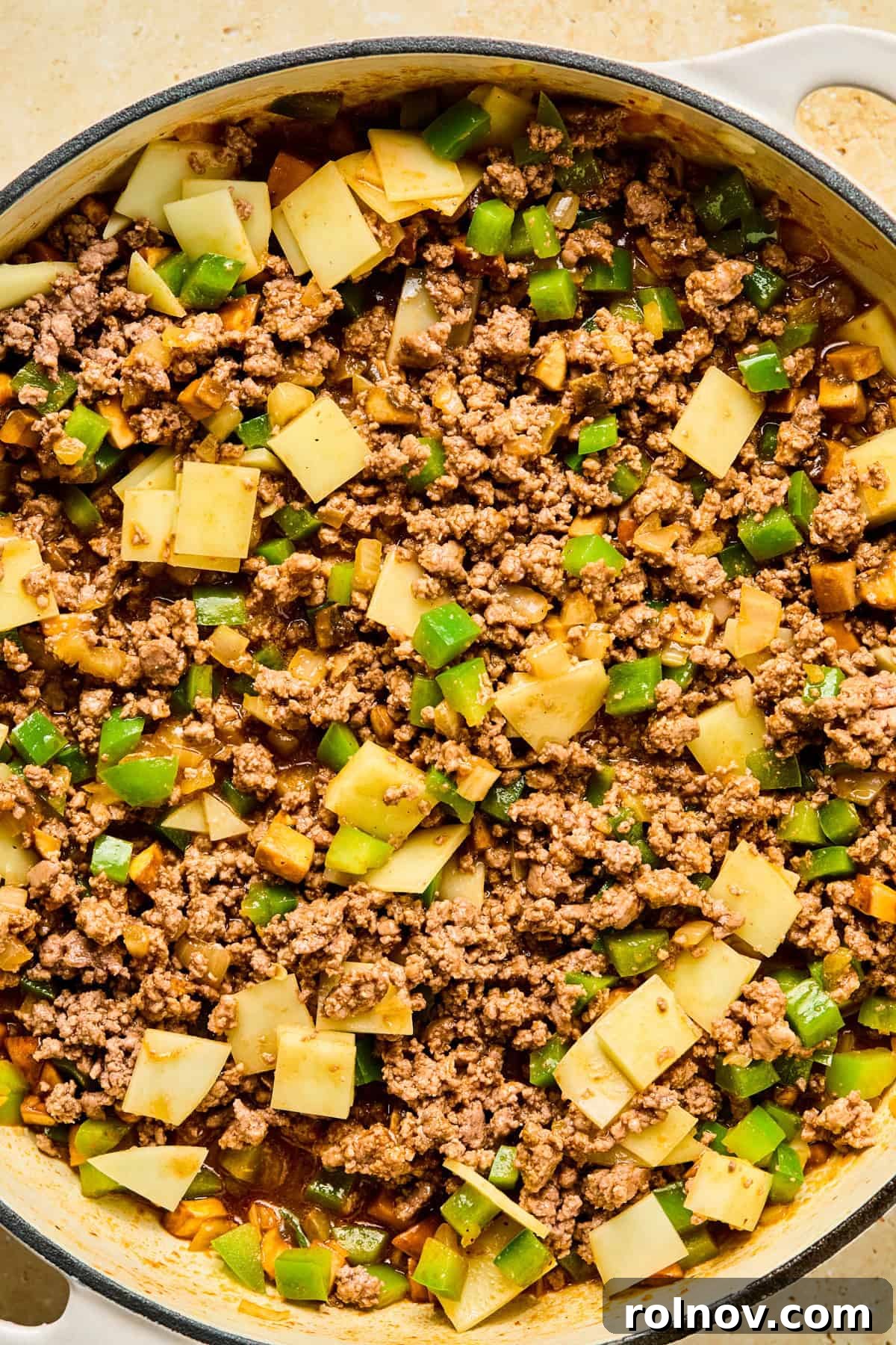 Philly Steak & Cheese Power Bowls 10 Ground beef stirred back into skillet with chopped provolone cheese pieces.
