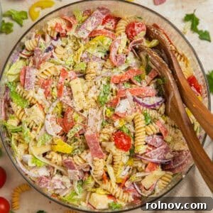 Italian grinder sub pasta salad in glass serving bowl.