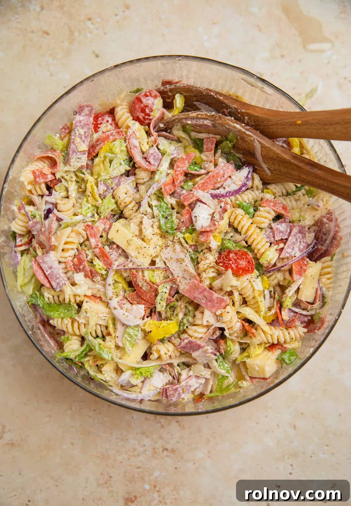 Loaded Grinder Pasta Salad 10 The Grinder Pasta Salad, fully tossed with dressing and ready to chill, showing all the colorful ingredients.