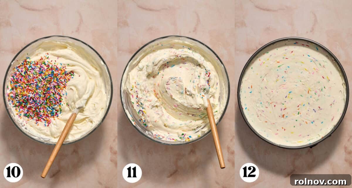 Rainbow sprinkles added to the funfetti cheesecake mixture, which is then poured into the chilled pie pan.