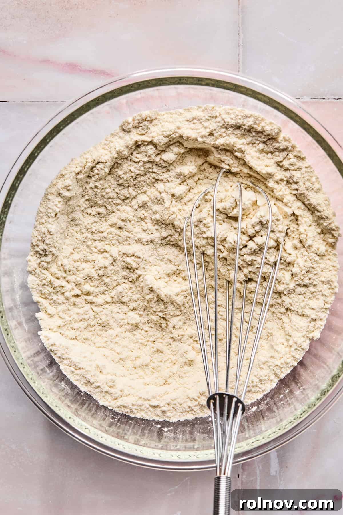 Frosted Sugar Delights 5 Dry ingredients are whisked together in a small mixing bowl.