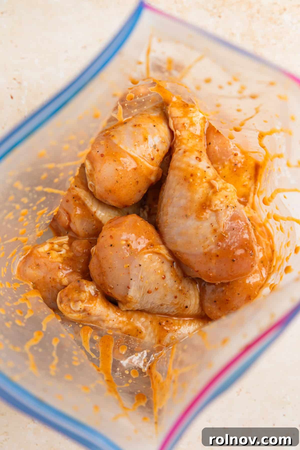 Sticky Honey Mustard Chicken Drumsticks Recipe 7 Chicken drumsticks in marinade in plastic bag before sitting.