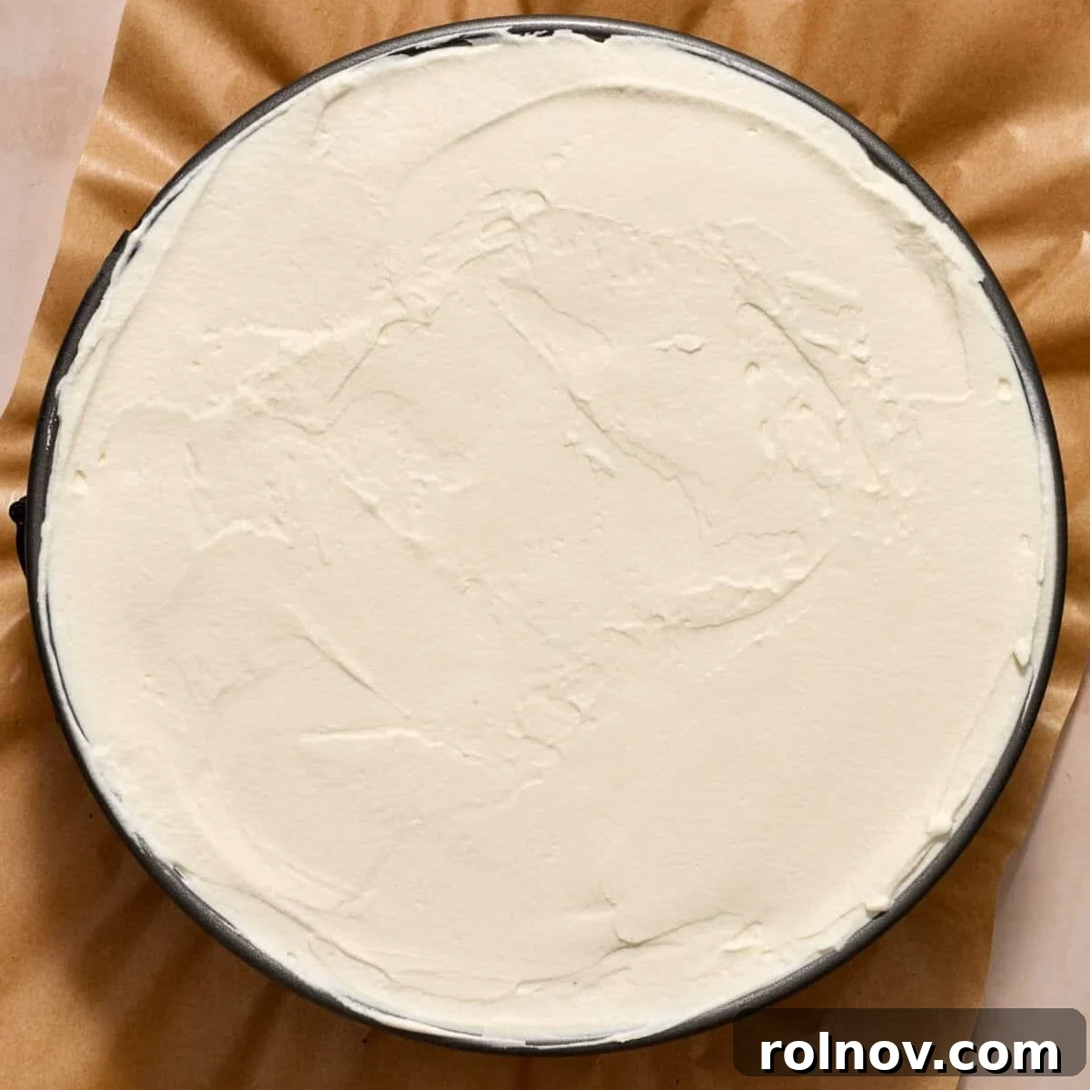 Oreo Ice Cream Pie Recipe: No-Bake Cookies and Cream Dessert 12 Whipped cream covered ice cream pie in pan.