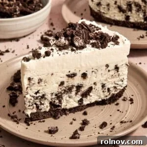 Oreo Ice Cream Pie Recipe: No-Bake Cookies and Cream Dessert 14 Slice of Oreo ice cream pie on plate.