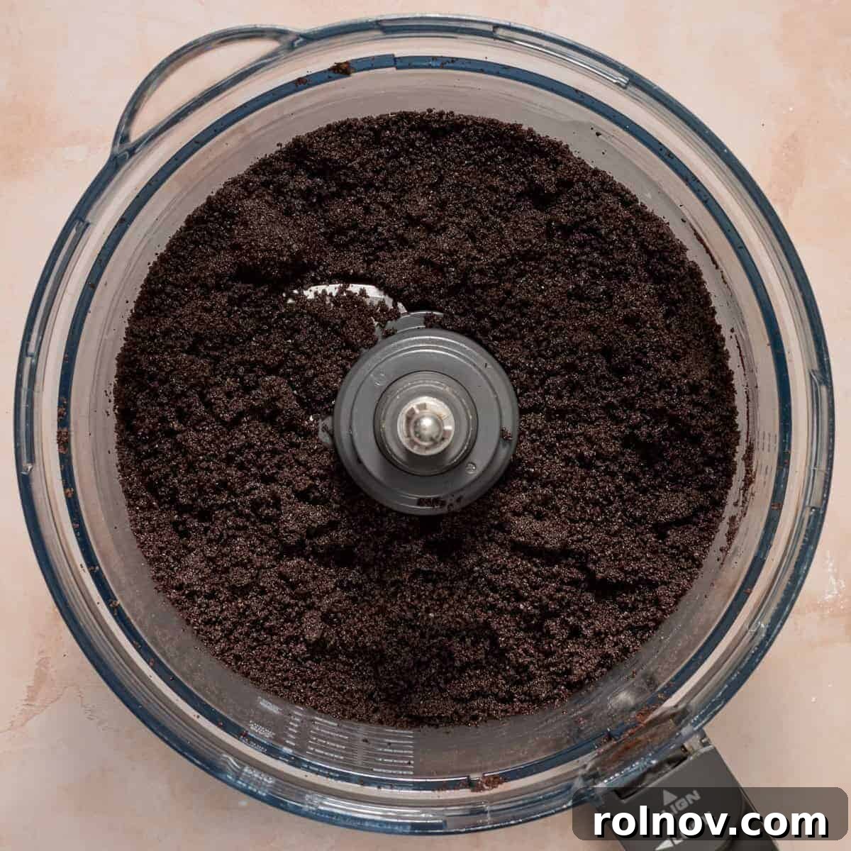 Oreo Ice Cream Pie Recipe: No-Bake Cookies and Cream Dessert 6 Crushed Oreos with butter and espresso powder in food processor.