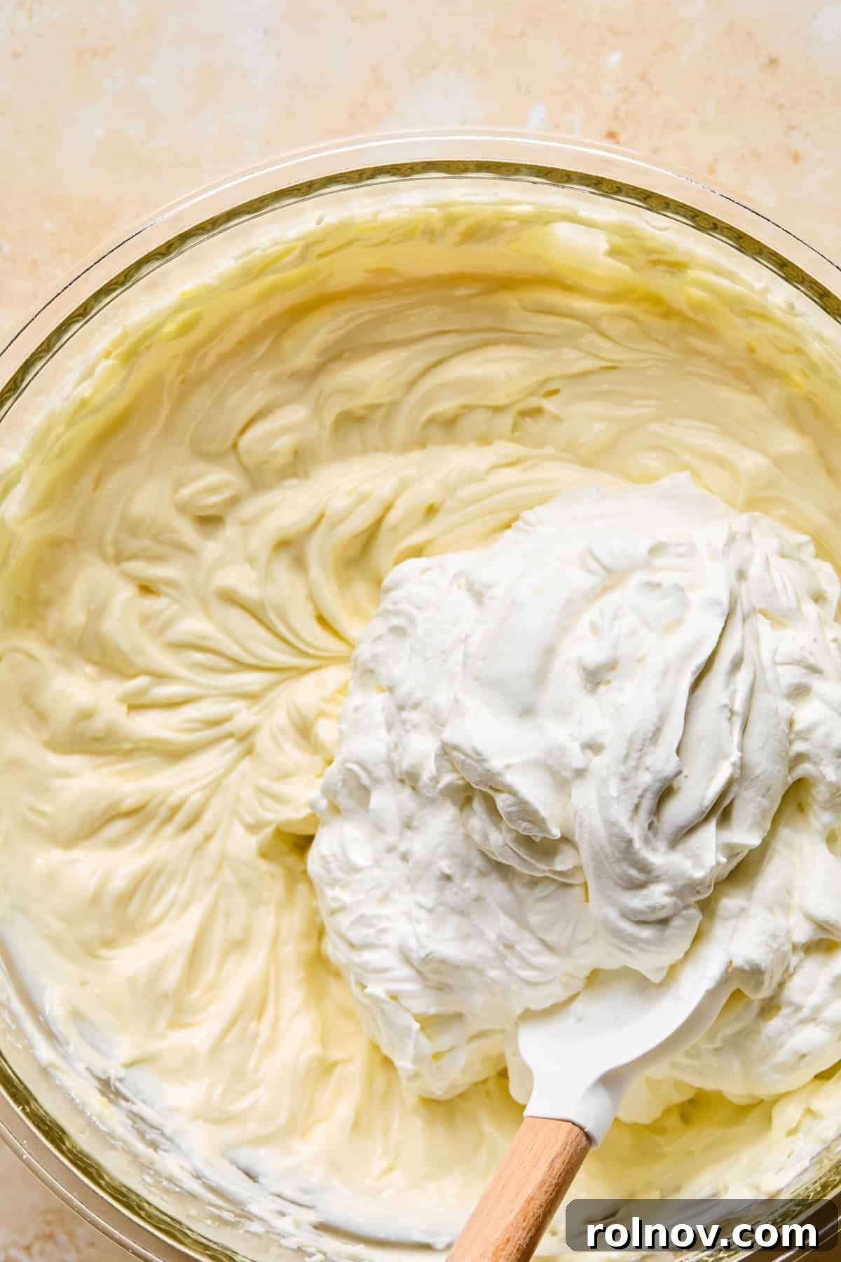 No-Bake Lemon Cheesecake Bars Recipe — Creamy Citrus Dessert 12 Whipped cream folded into lemon cream cheese mixture.