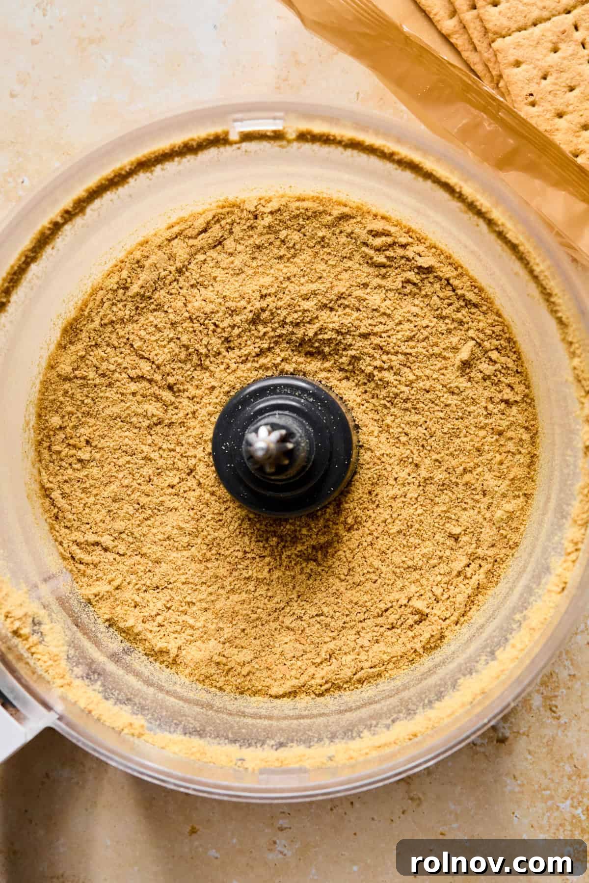 No-Bake Lemon Cheesecake Bars Recipe — Creamy Citrus Dessert 5 Graham cracker crumbs in food processor.