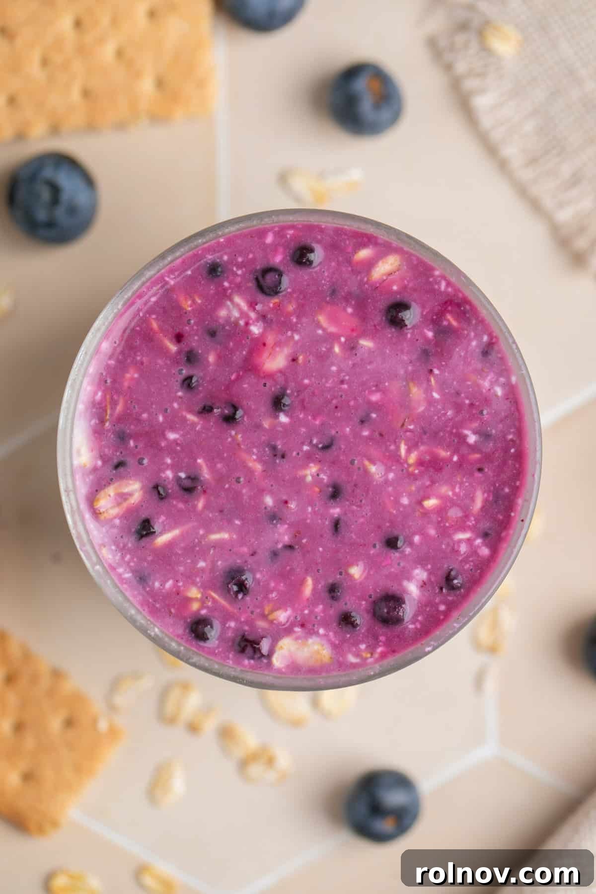 Blueberries mixed with overnight oats before chilling.