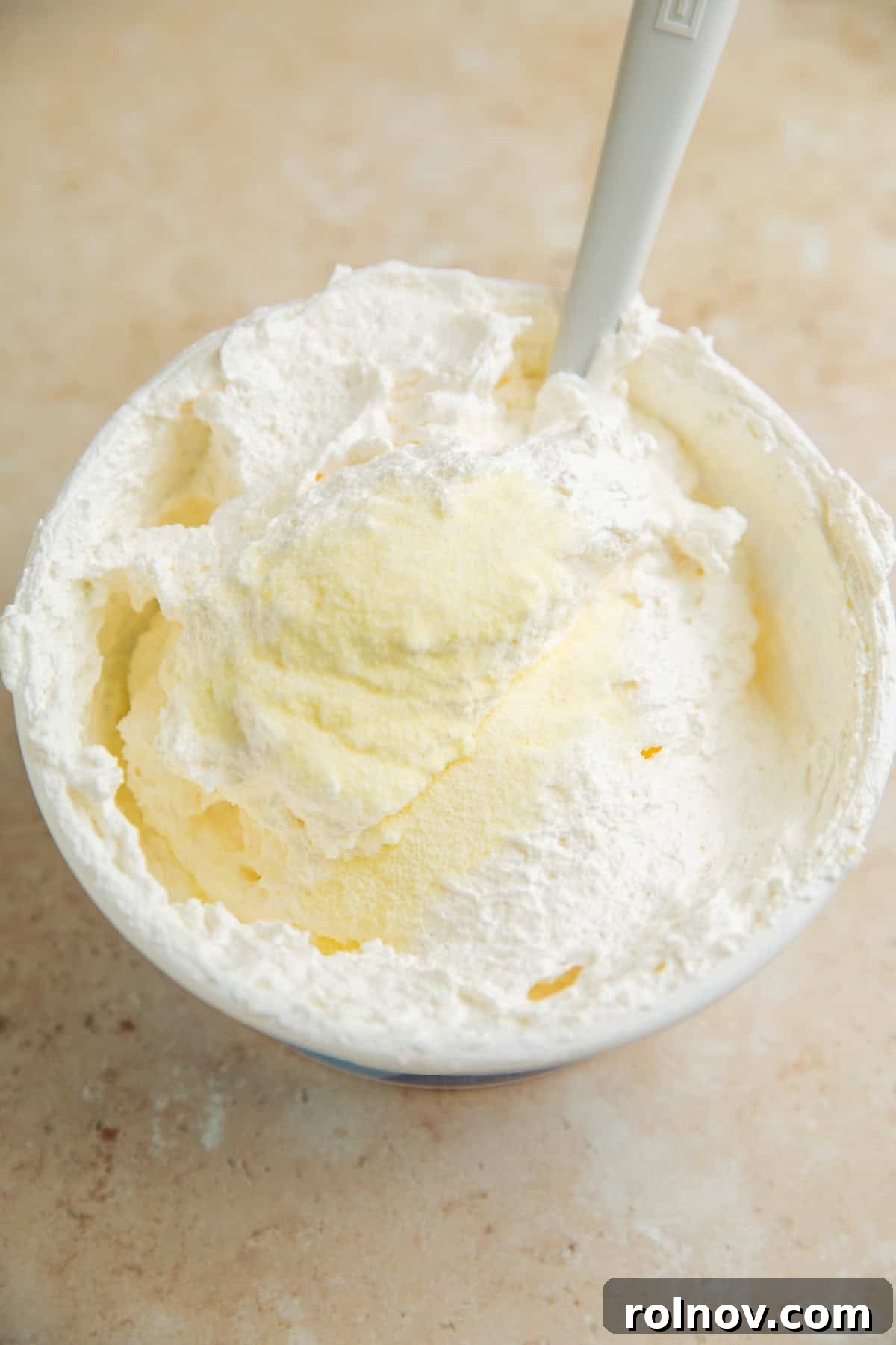 Lemonade Ice Cream Sandwich Recipe — Refreshing Citrus Treat 4 Cool whip tub with lemonade powder mix added.