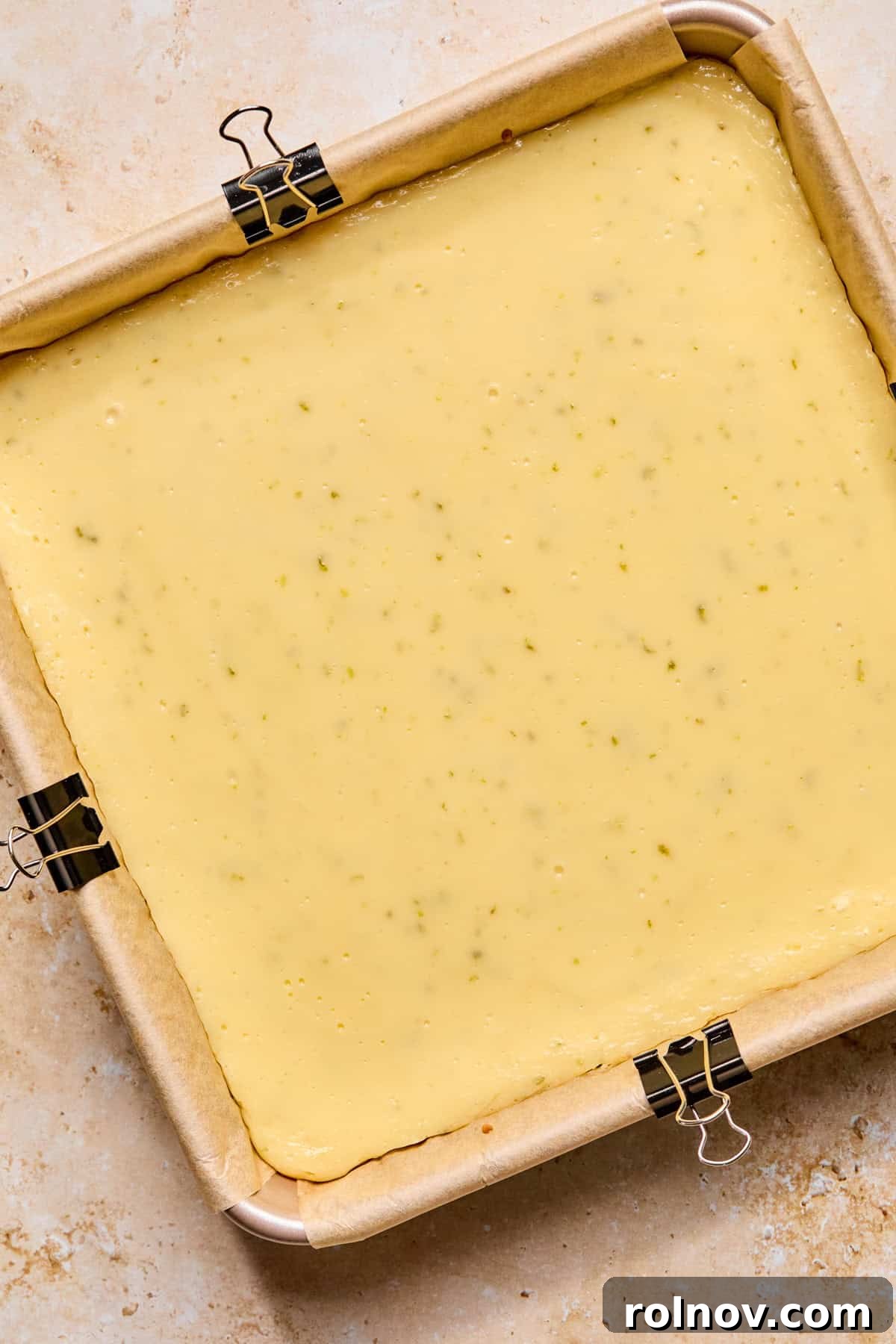 Baked creamy margarita bars in pan.