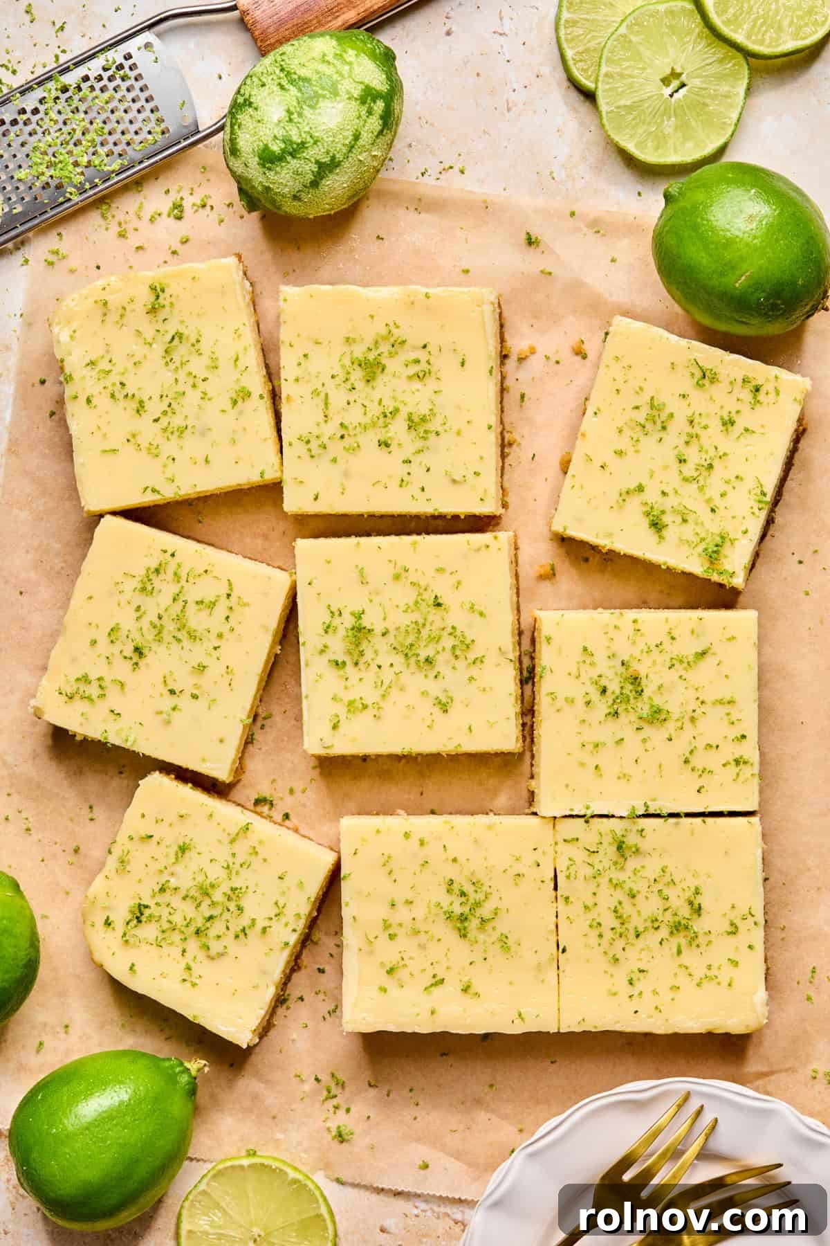 Overhead view of margarita lime bars on parchment paper.