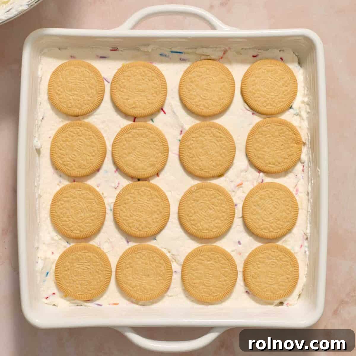 4 by 4 Golden Oreos arranged in pan.