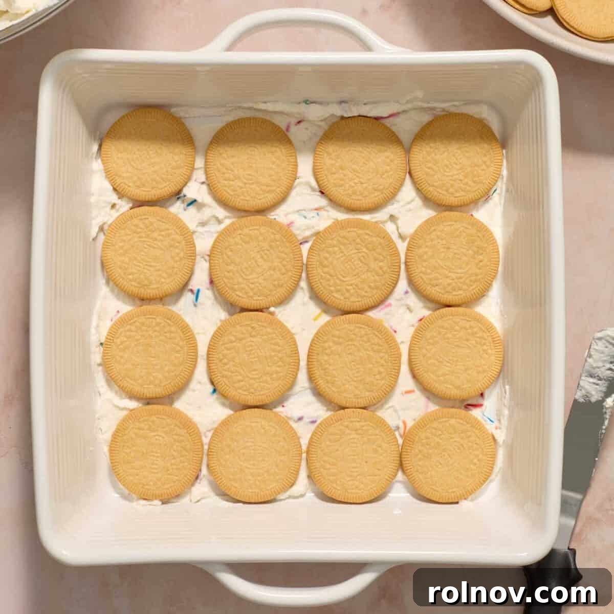 White baking pan with Golden Oreo thins arranged 4x4.