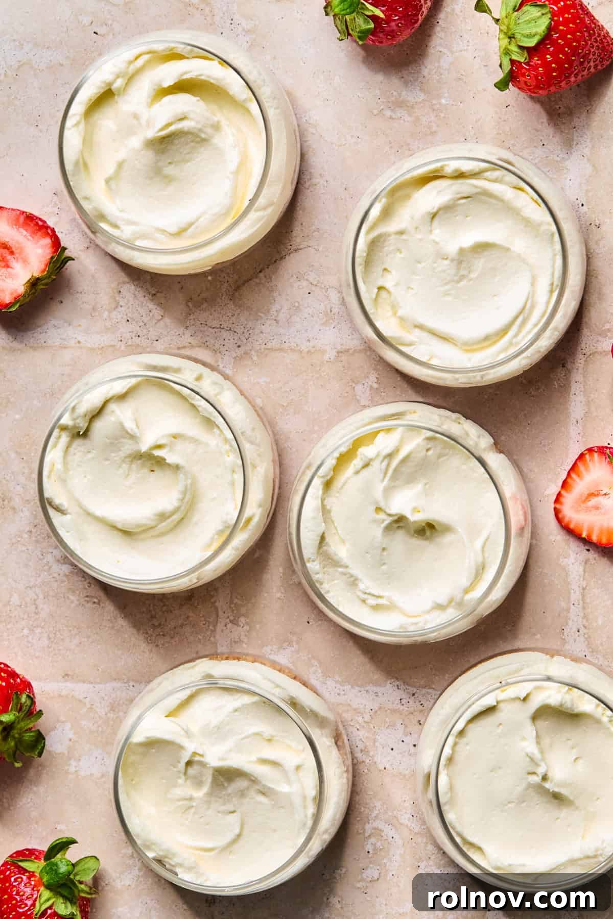 Roasted Strawberry Mini Cheesecake Cups Recipe 12 Cheesecake mixture added to dessert cups over graham cracker crust.