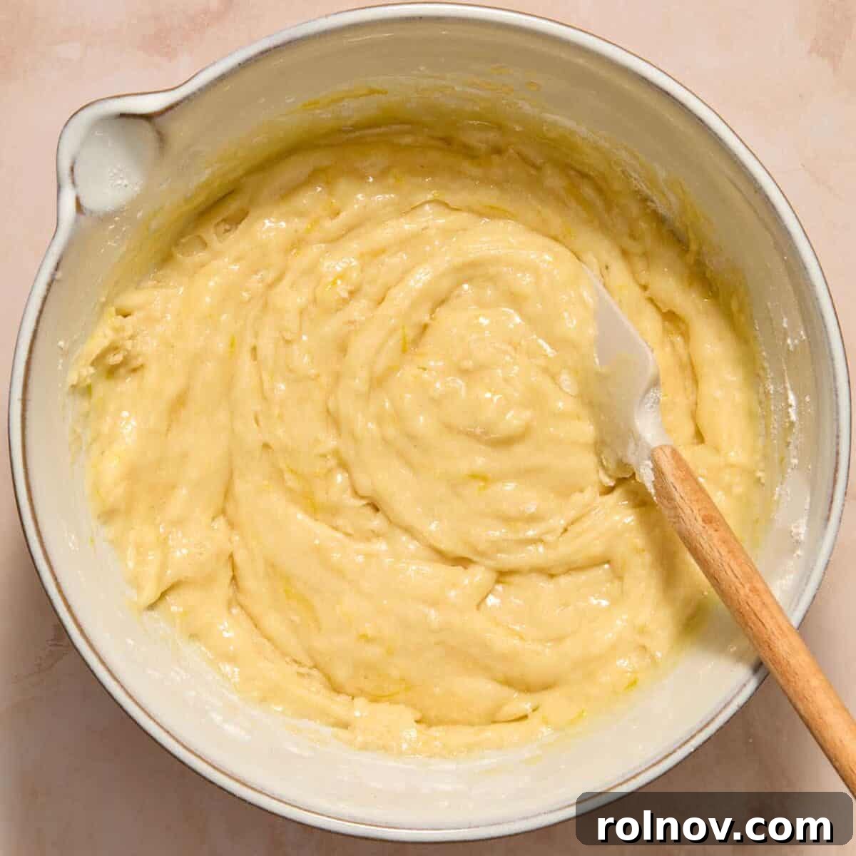 Moist Lemon Zucchini Bread with Citrus Glaze 8 Dry ingredients combined with wet ingredients for lemon zucchini bread recipe.