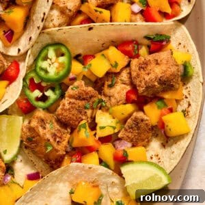 Crispy Baja Fish Tacos with Fresh Mango Salsa 12 Mahi mahi tacos with mango salsa and lime wedges.