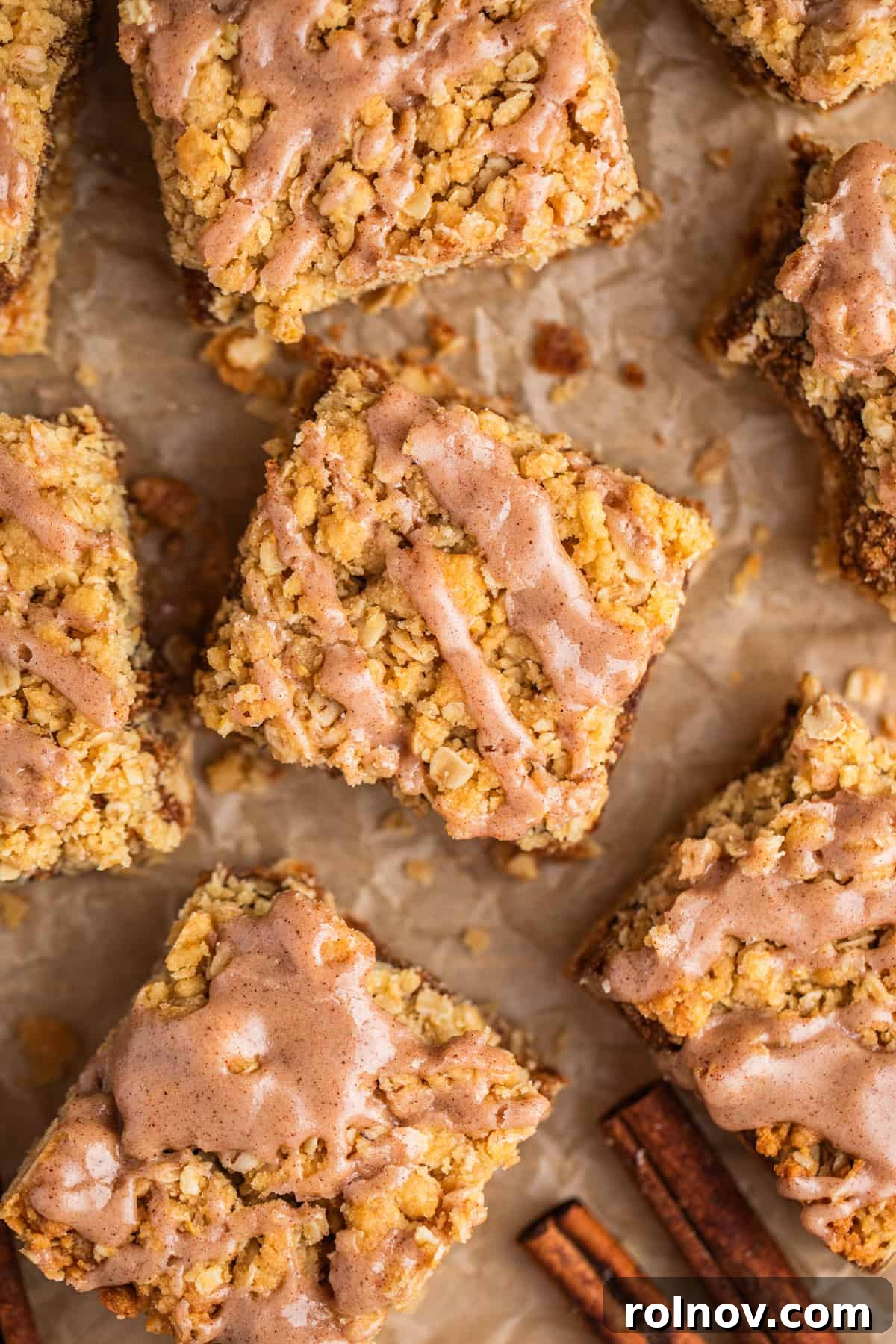 Brown sugar cinnamon oatmeal crumb bars with cinnamon drizzle.