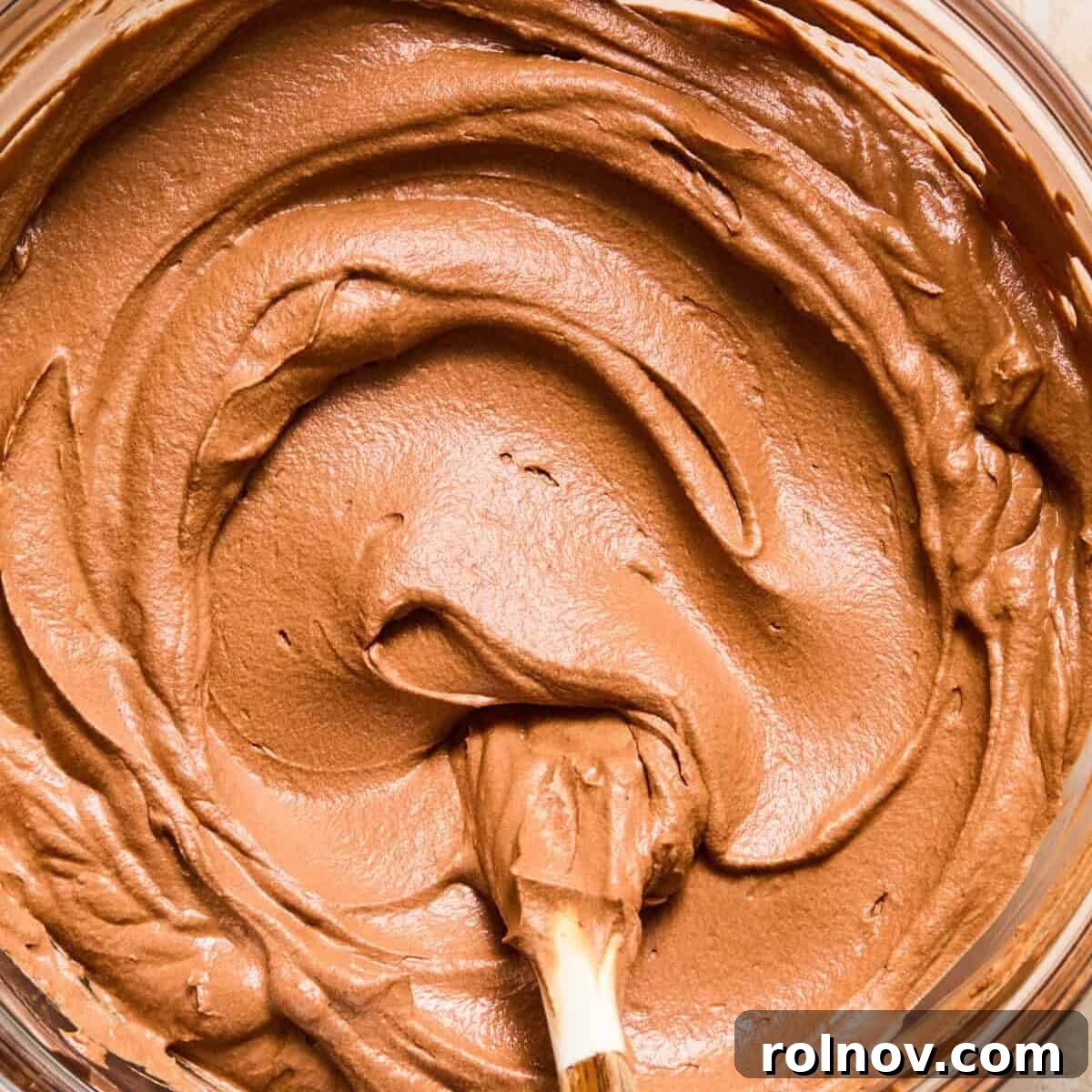 Espresso Martini Bars Near You: Where to Go Tonight 11 Chocolate espresso martini cream filling in bowl with spoon.