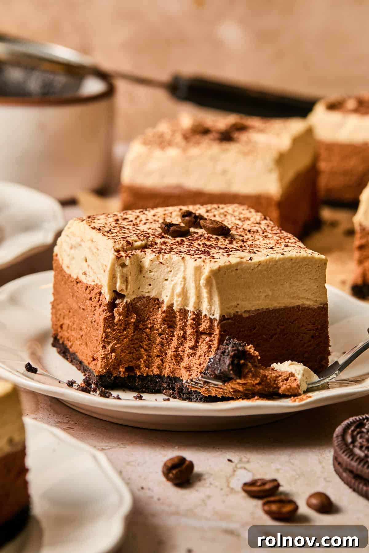 Espresso Martini Bars Near You: Where to Go Tonight 15 Espresso martini chocolate bar on plate with forkful of dessert.