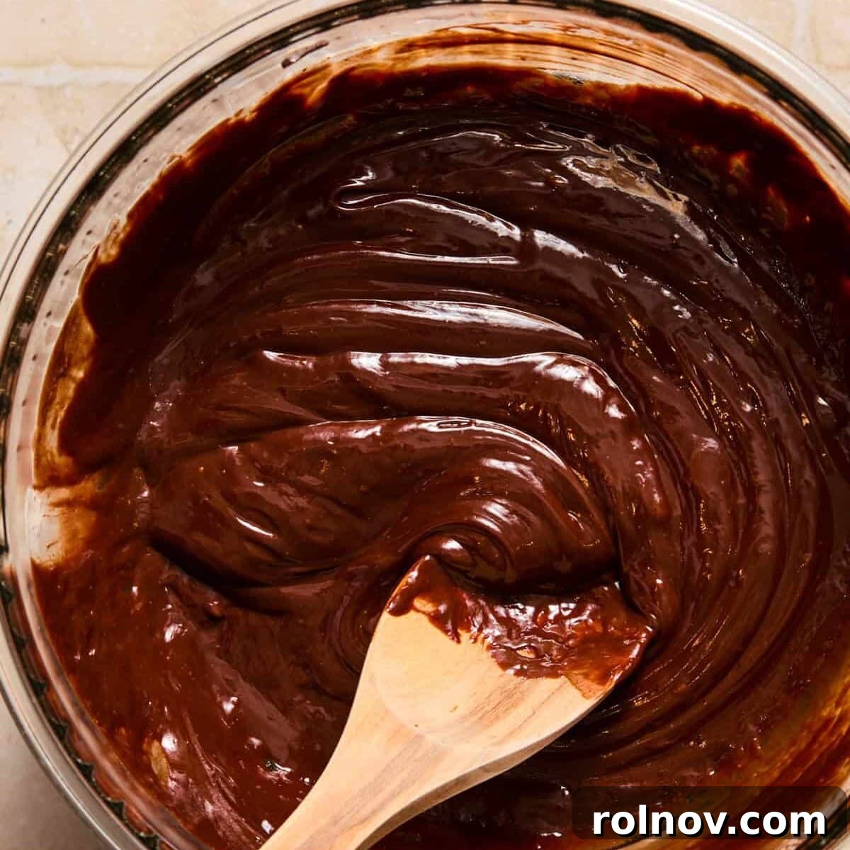 Espresso Martini Bars Near You: Where to Go Tonight 8 Melted chocolate and heavy cream ganache in bowl.
