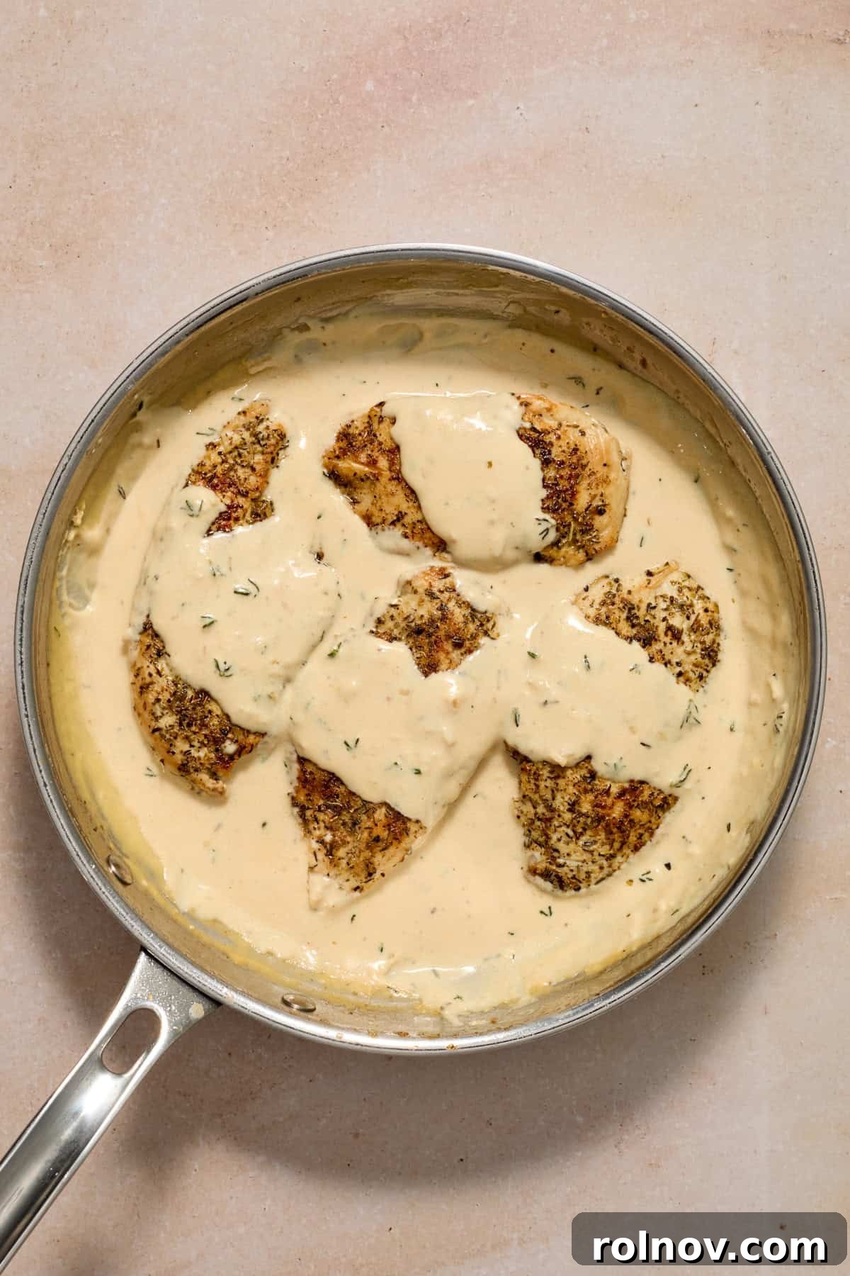 Creamy Garlic Parmesan Chicken Recipe 10 Pan with garlic parmesan cream sauce and chicken.