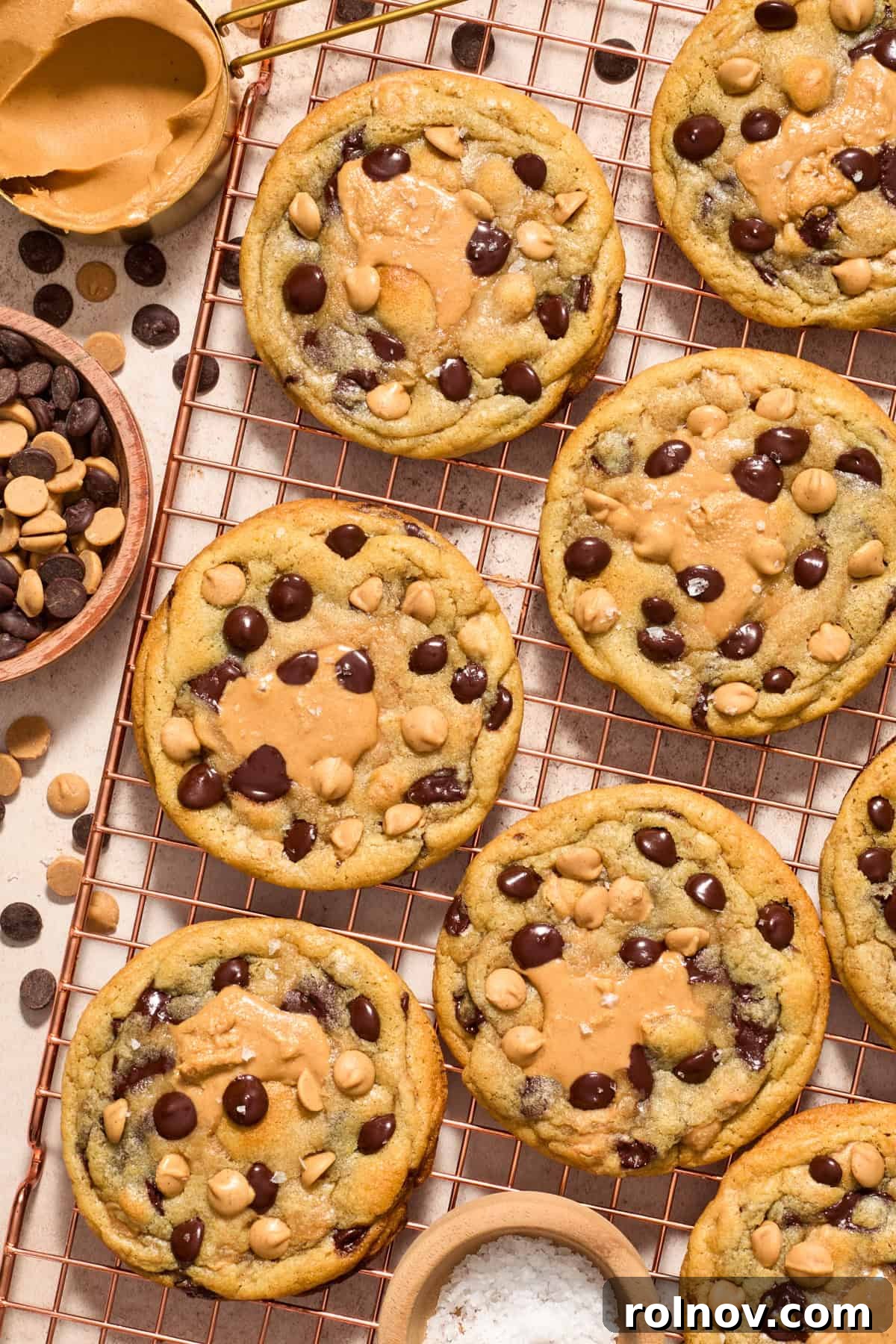 Cooling rack with peanut butter filled cookies.