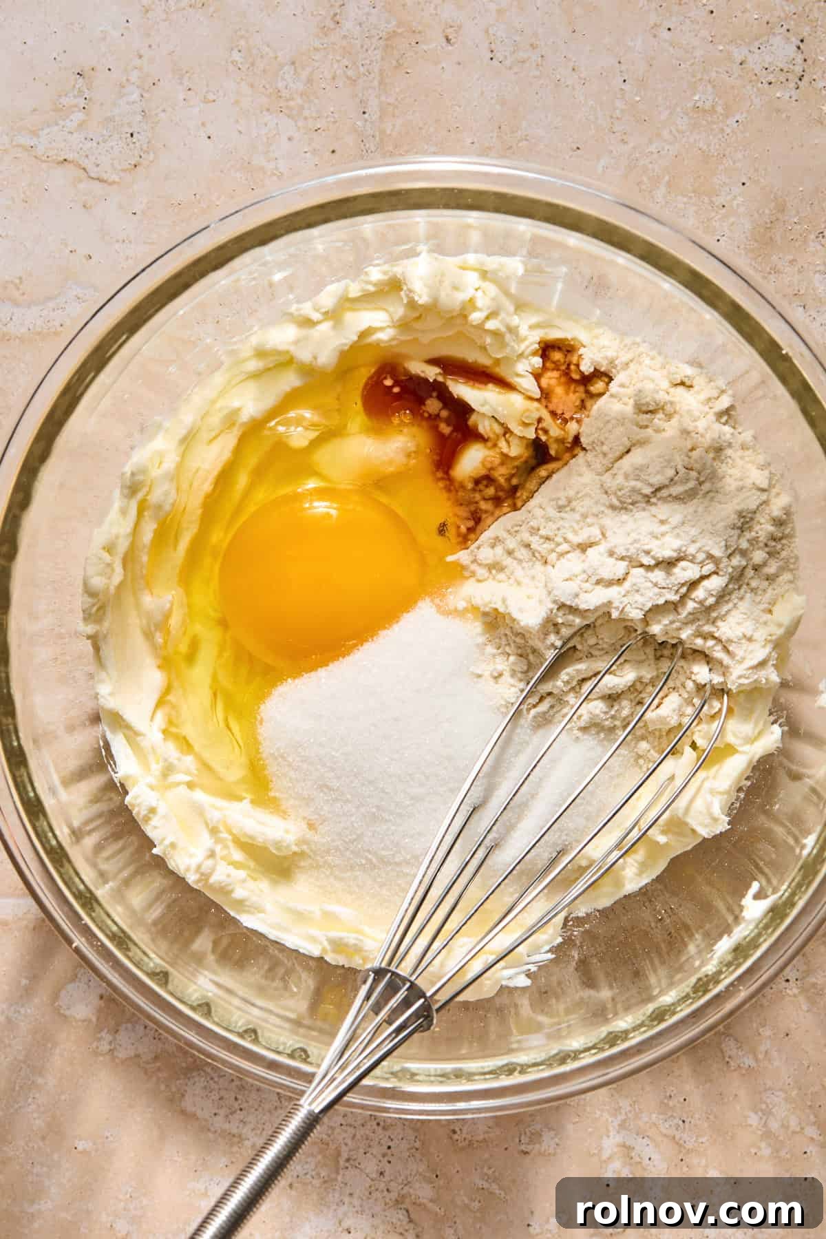 Cinnamon Pumpkin Bread with Cream Cheese Swirl 9 Cream cheese with egg, cinnamon and sugar added to bowl with it.
